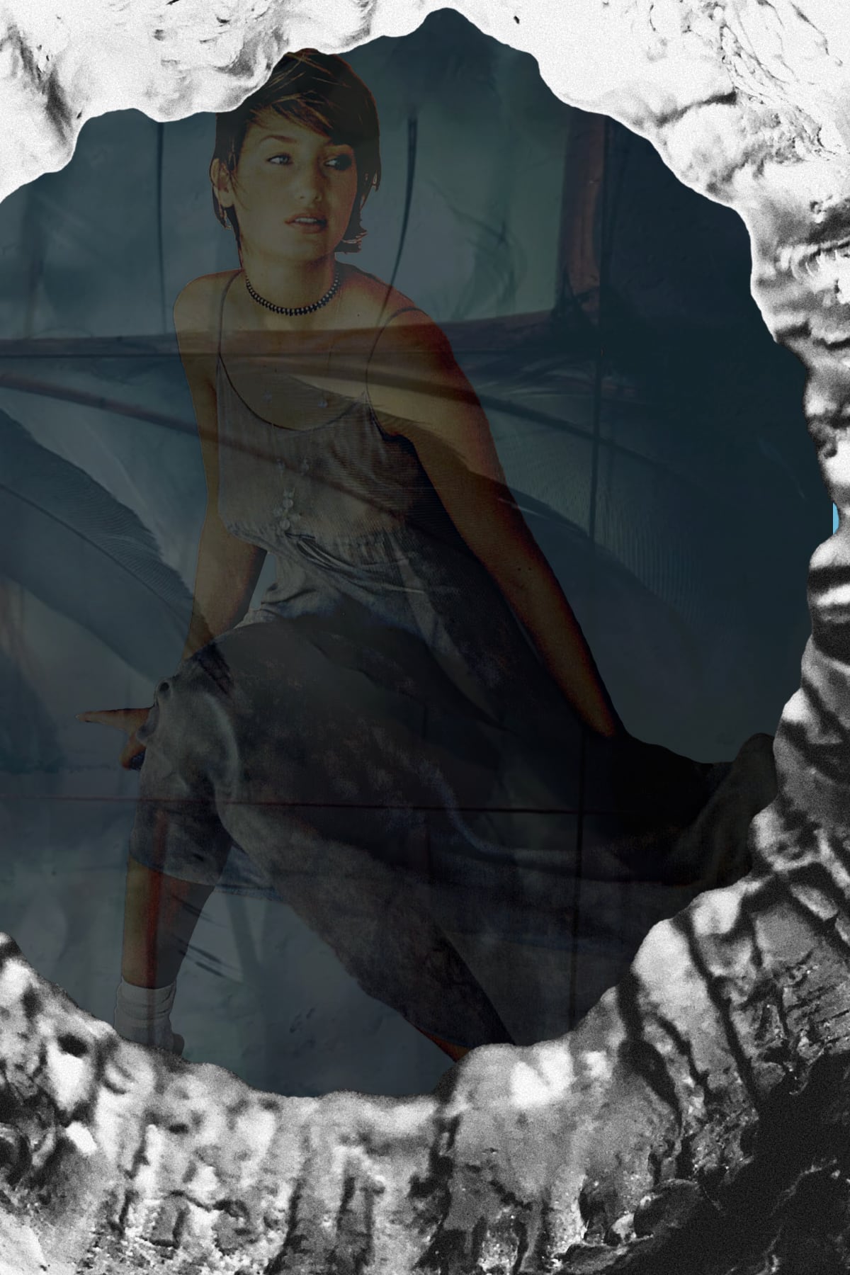 young woman in flowing dress as seen through a glass darkly