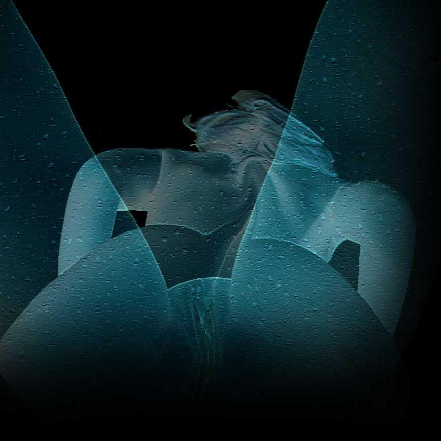 female figure as sculpture seen from behind and below