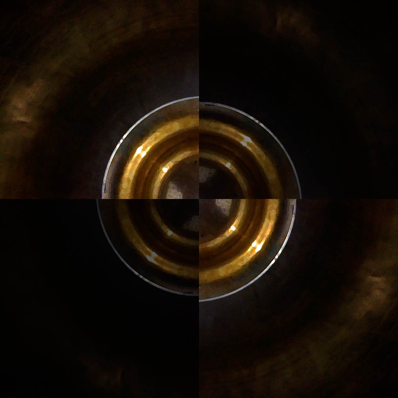 bronze circle divided into quadrants