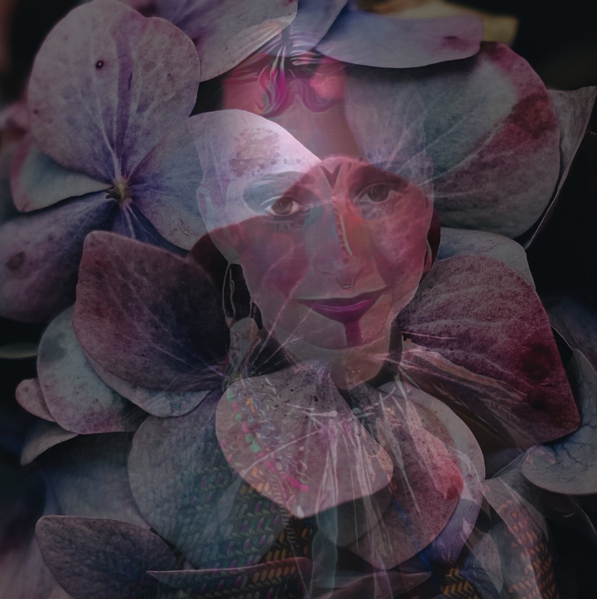 young woman face made up as a flamingo surrounded by petals of a giant flower