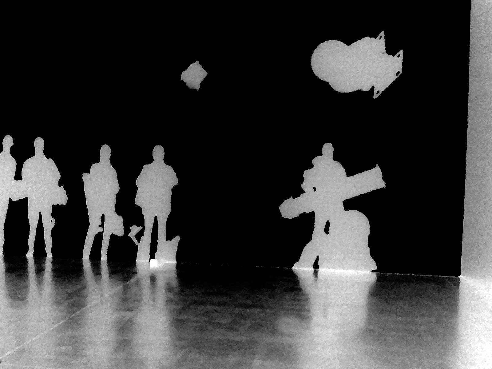 ghostly images of people holding things that look like musical instruments or weapons