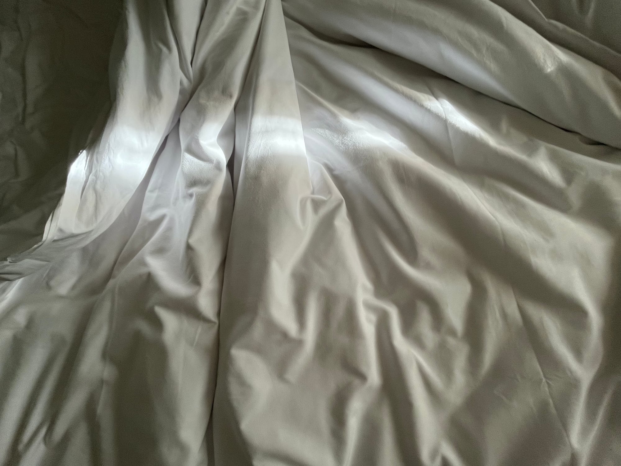 crumpled bed sheet