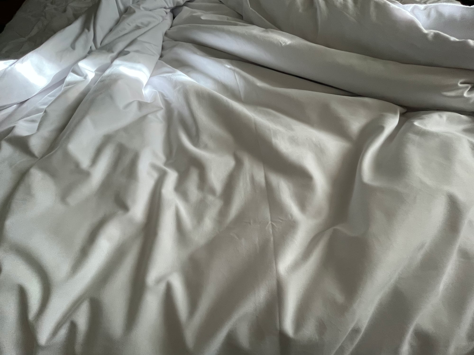 crumpled bed sheet