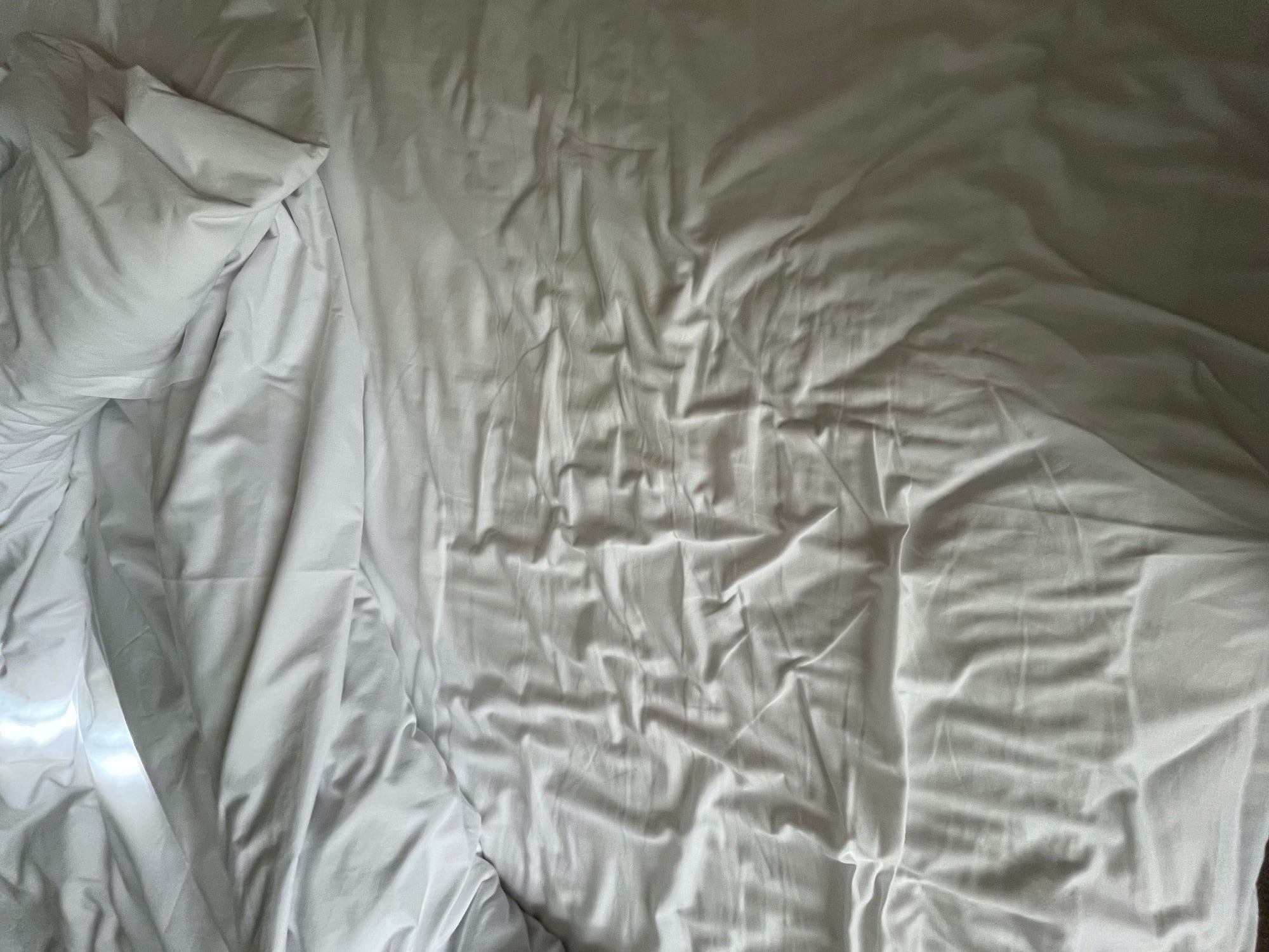 crumpled bed sheet