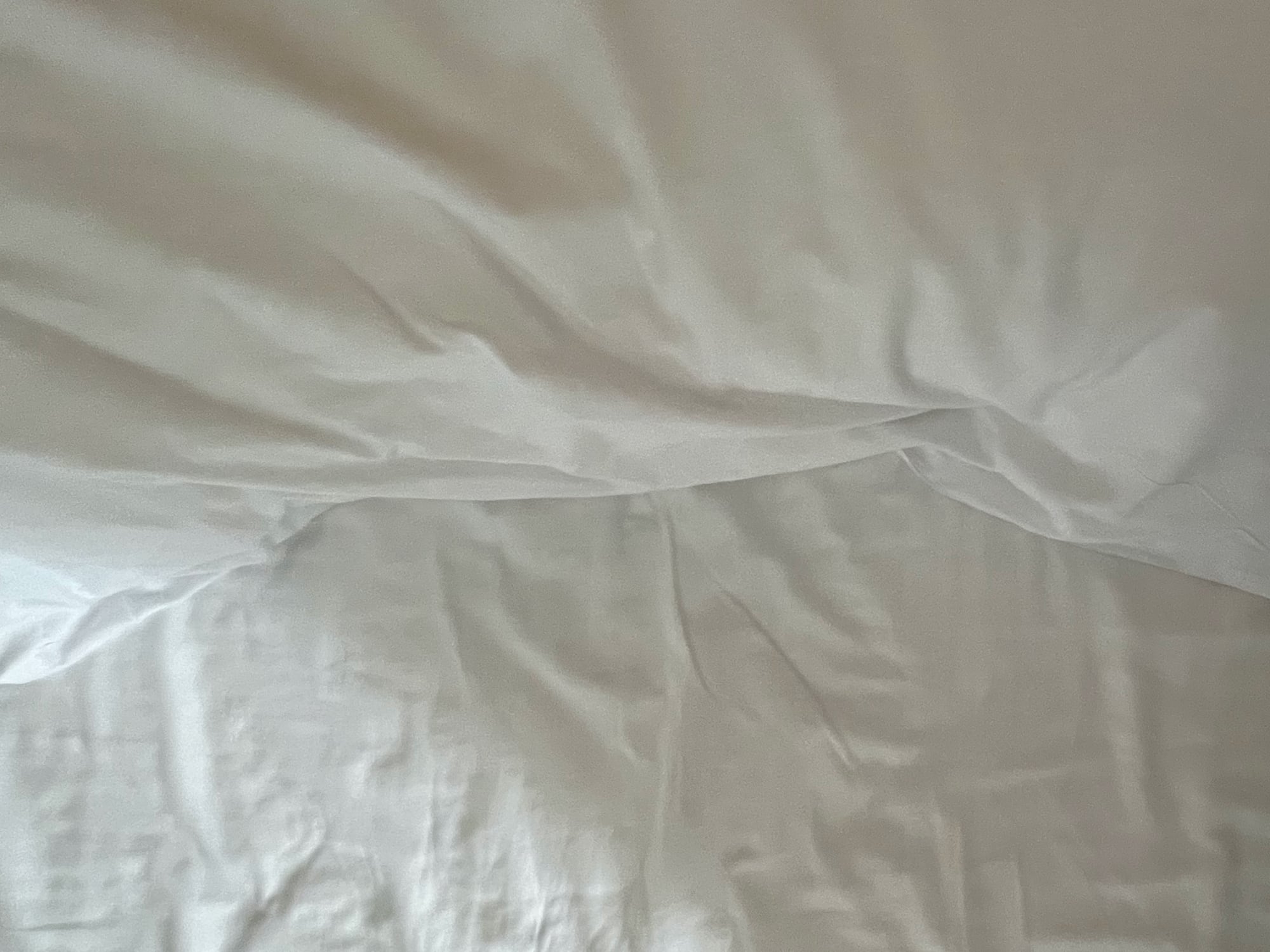 crumpled bed sheet